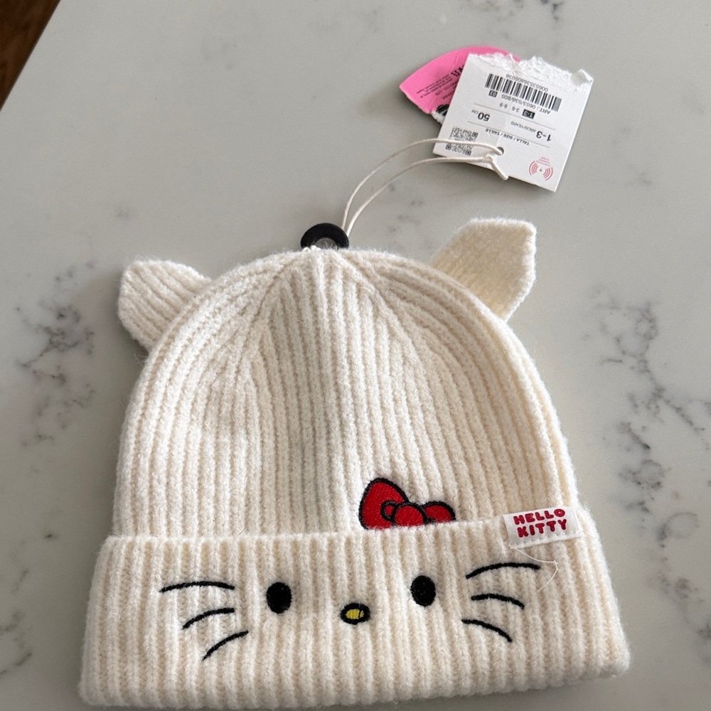 Hello Kitty Cream Knit Kids Hat with Red Bow Accent